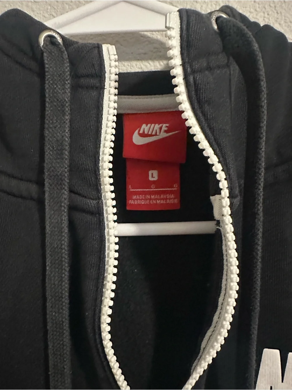 Nike Black Hoodie with White Zipper and Logo